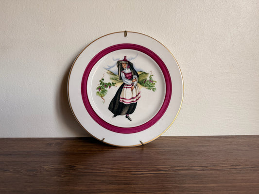 Vintage plate wall with traditional Portuguese dress  1970S